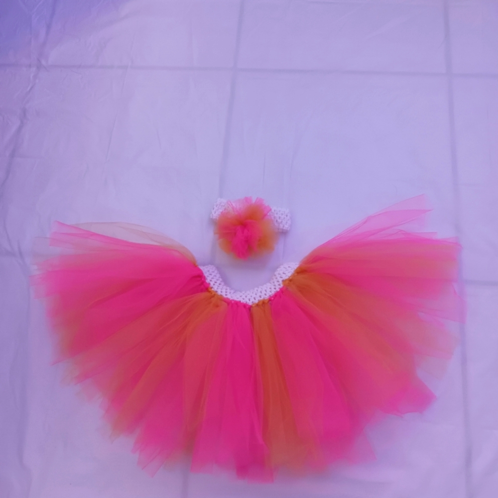 Tutu with hair band. Size 3-4 years old. Color golden and pink.